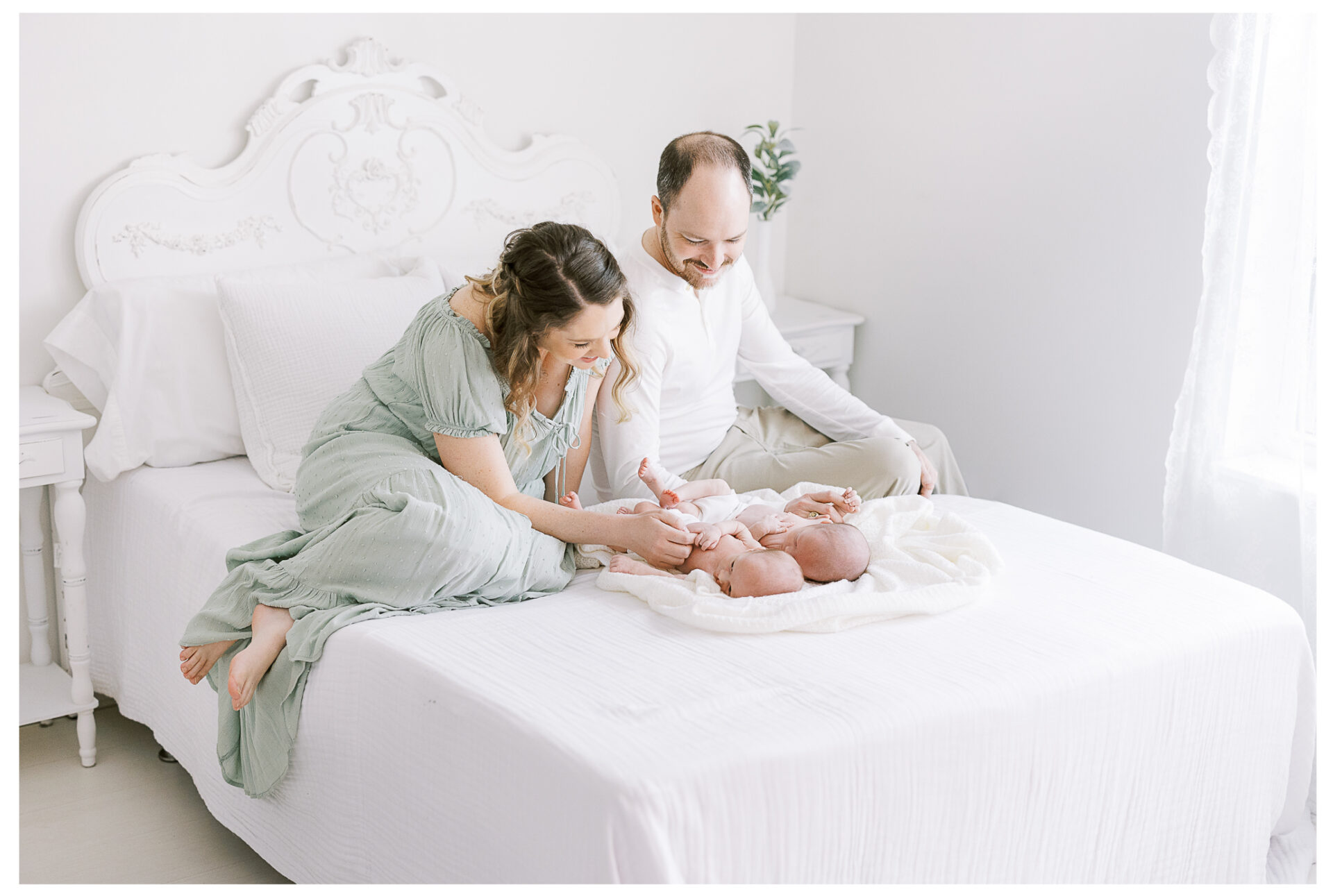 Newborn baby boy photography session | Baby brothers snuggling with their mother and father