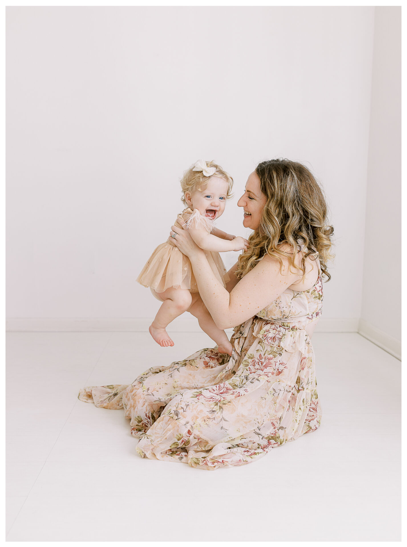 Winter Freire Photography | First birthday photos for baby girl in a photography studio with her mother