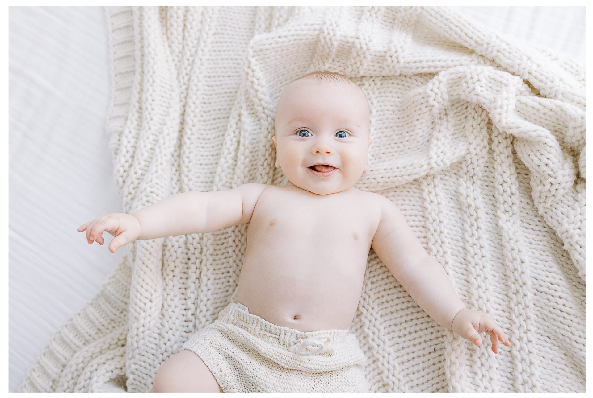 Winter Freire Photography | Dayton, Ohio Baby Milestone Session | Organic Family Studio Photography | 6 Month old baby smiling at the camera