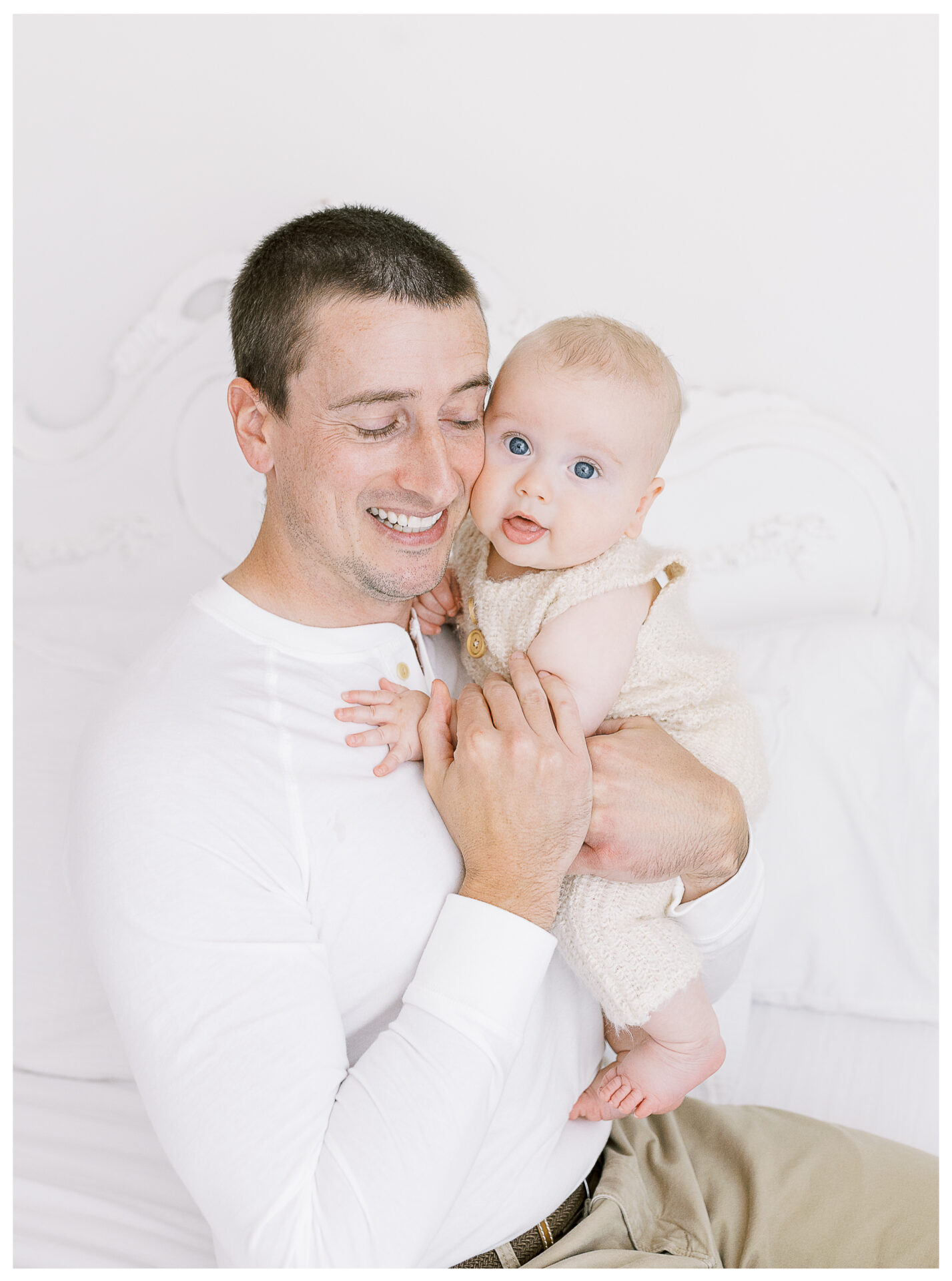 Winter Freire Photography | Dayton, Ohio Baby Milestone Session | Organic Family Studio Photography | 6 Month old baby smiling with his father