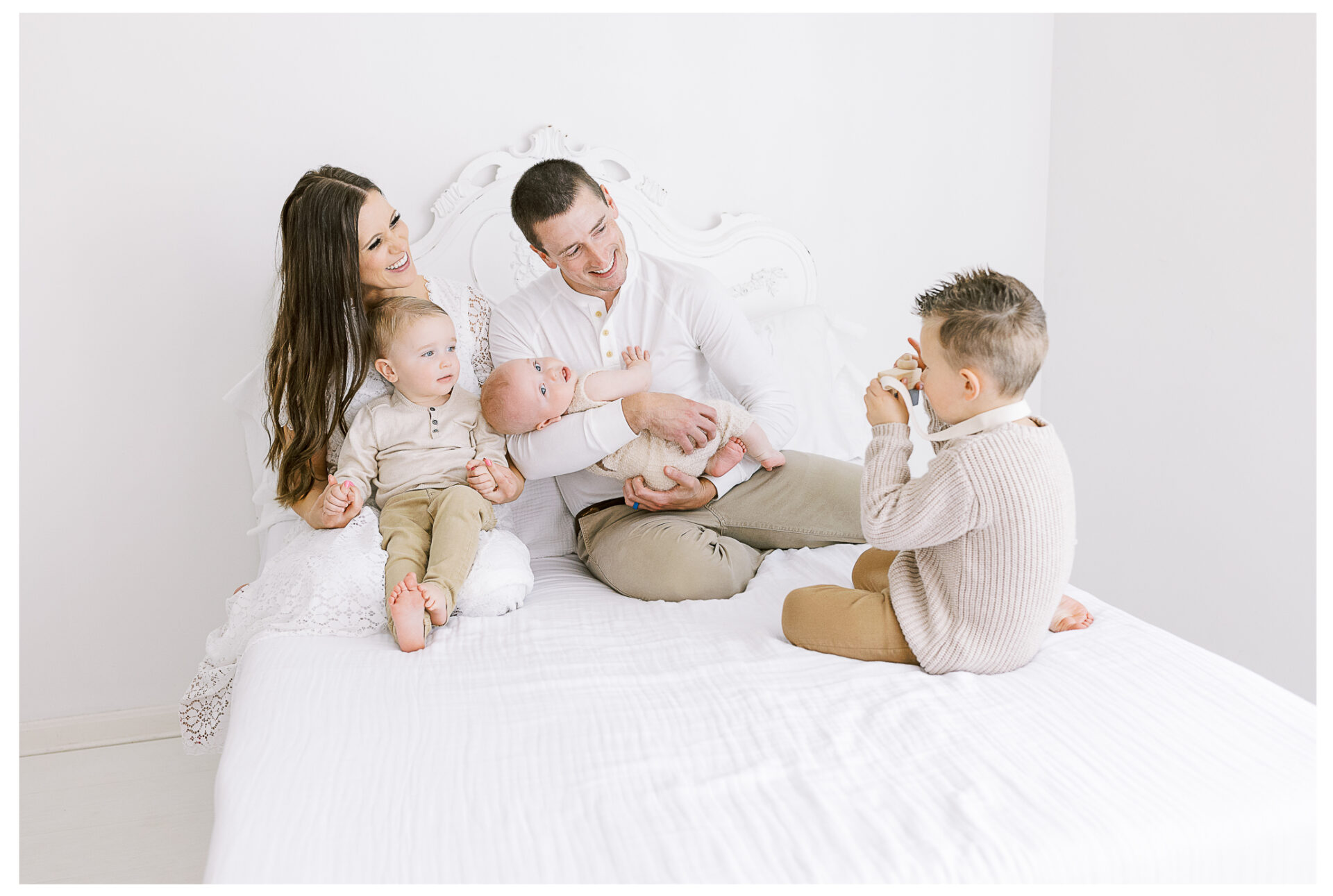 Winter Freire Photography | Dayton, Ohio Baby Milestone Session | Organic Family Studio Photography | 6 Month old baby with his parents and two big brothers