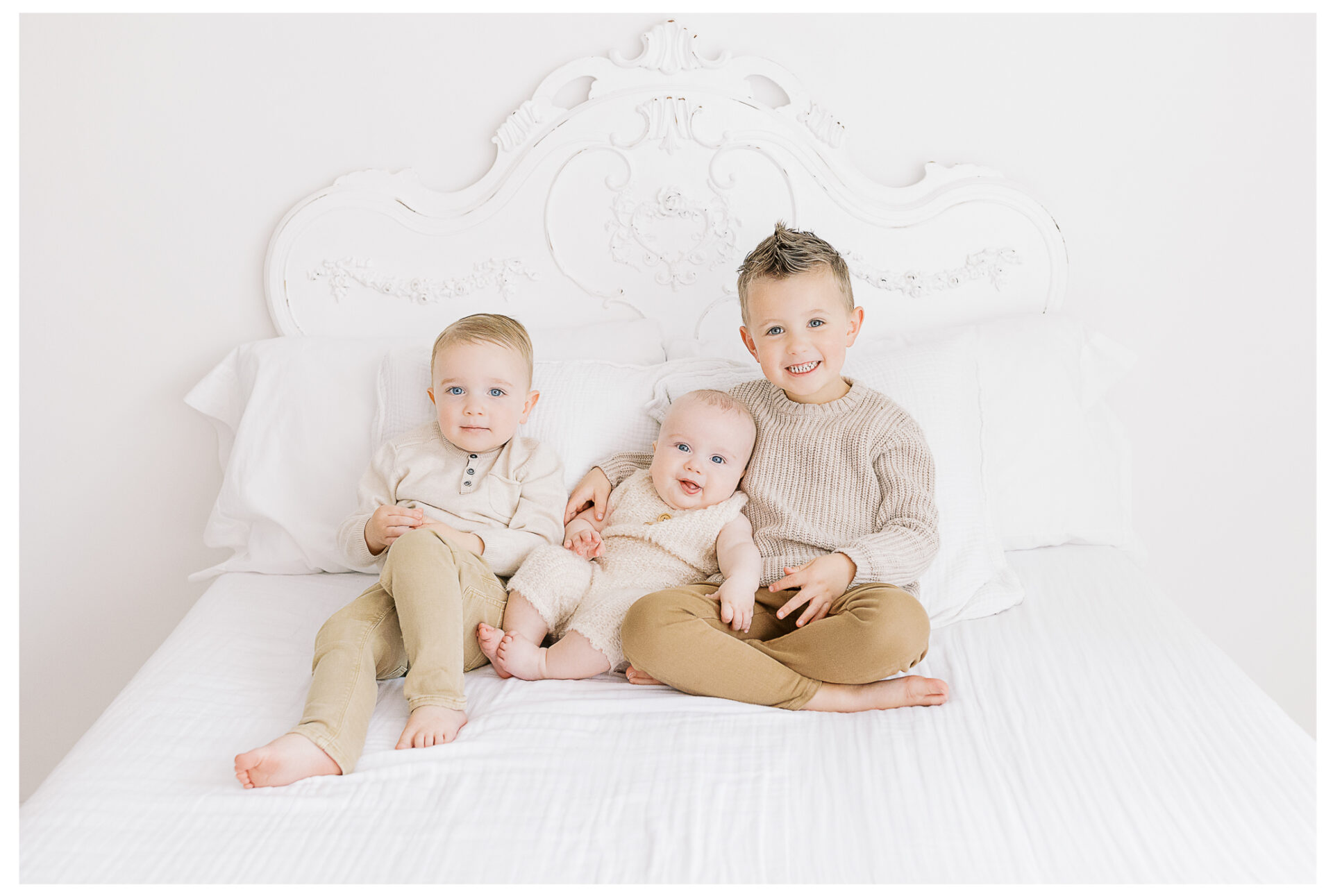 Winter Freire Photography | Dayton, Ohio Baby Milestone Session | Organic Family Studio Photography | 6 Month old baby with his two big brothers