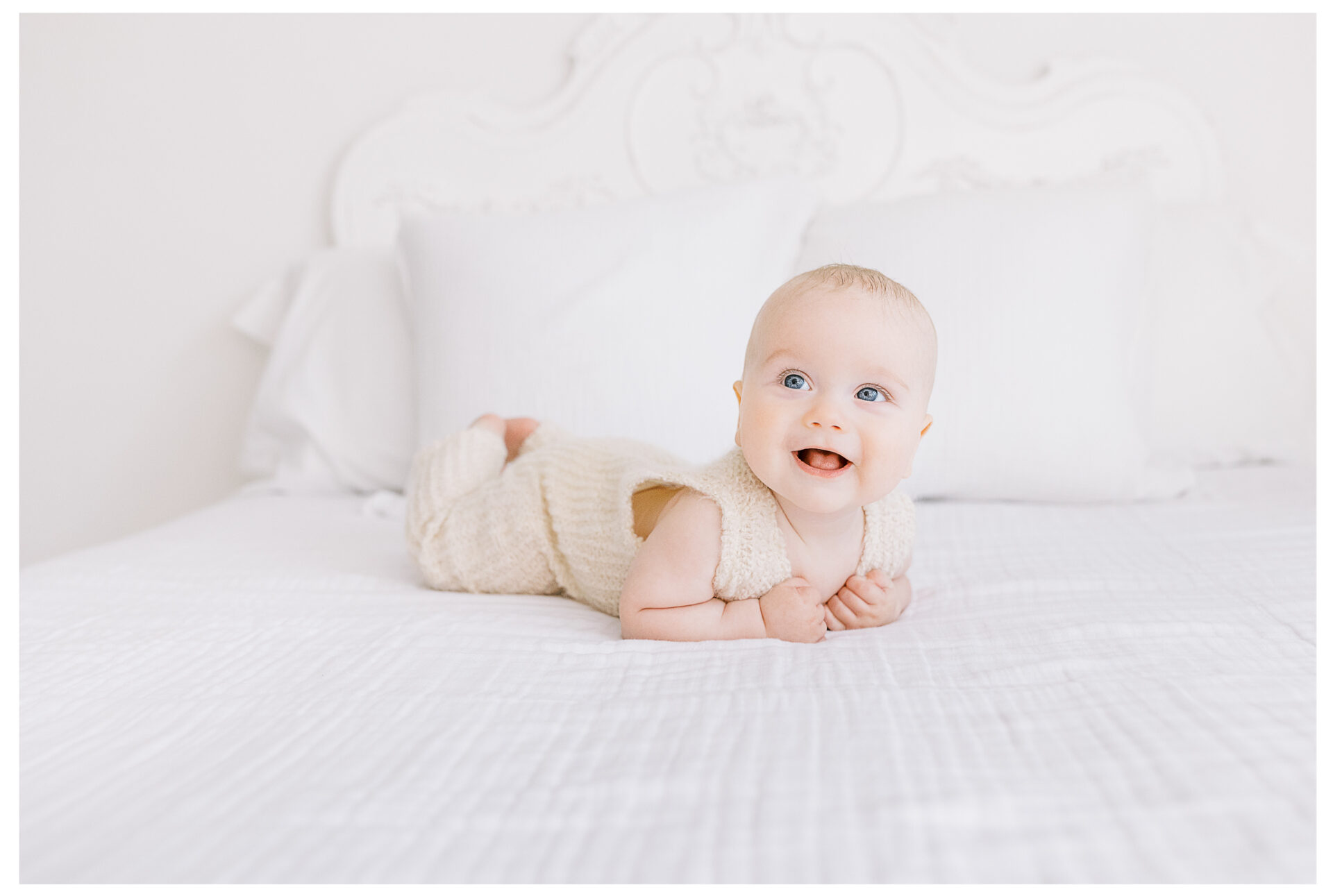 Winter Freire Photography | Dayton, Ohio Baby Milestone Session | Organic Family Studio Photography | 6 Month old baby laying on his tummy smiling