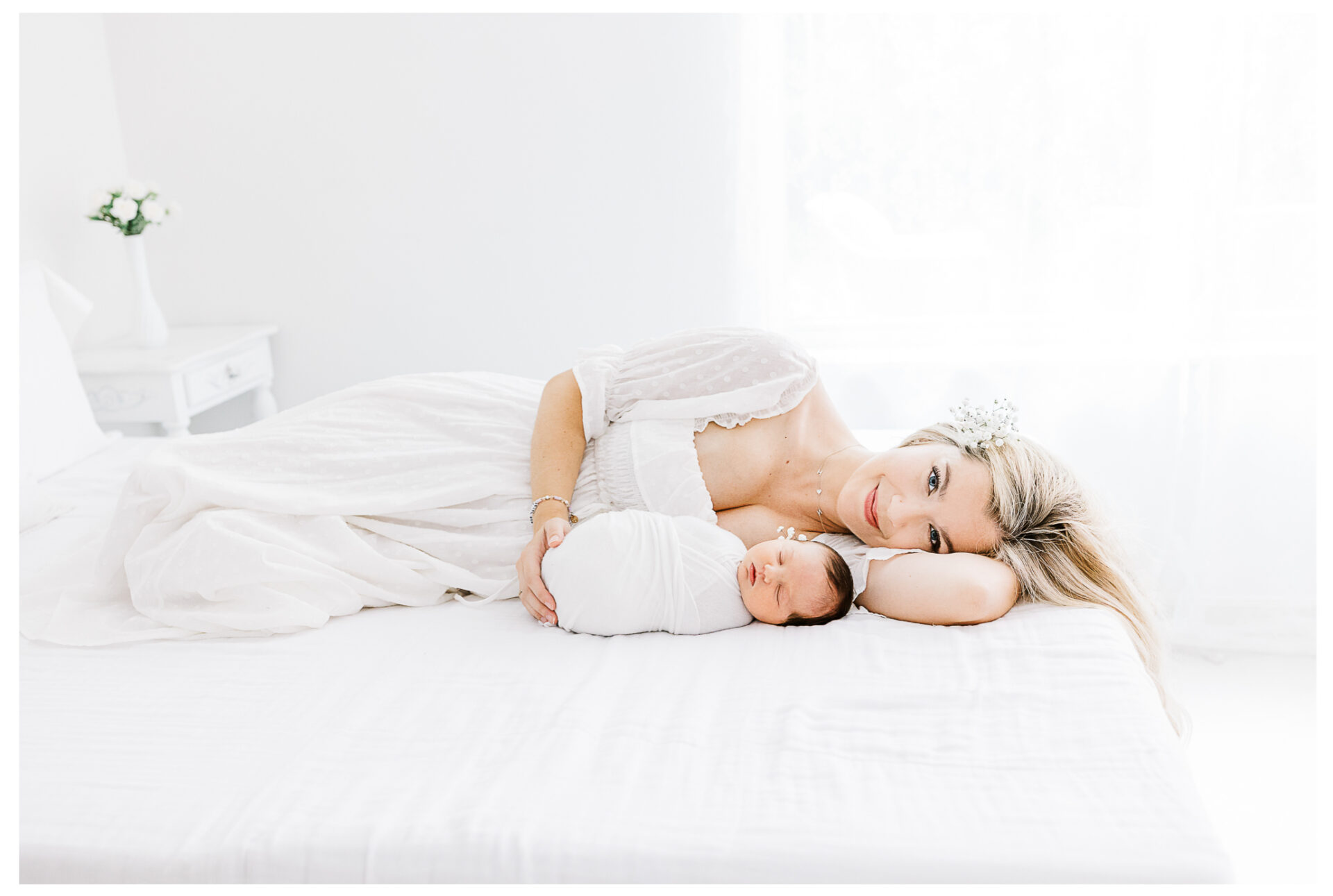 Winter Freire Photography | Dayton, Ohio Newborn Session | Mom laying beside her newborn baby girl