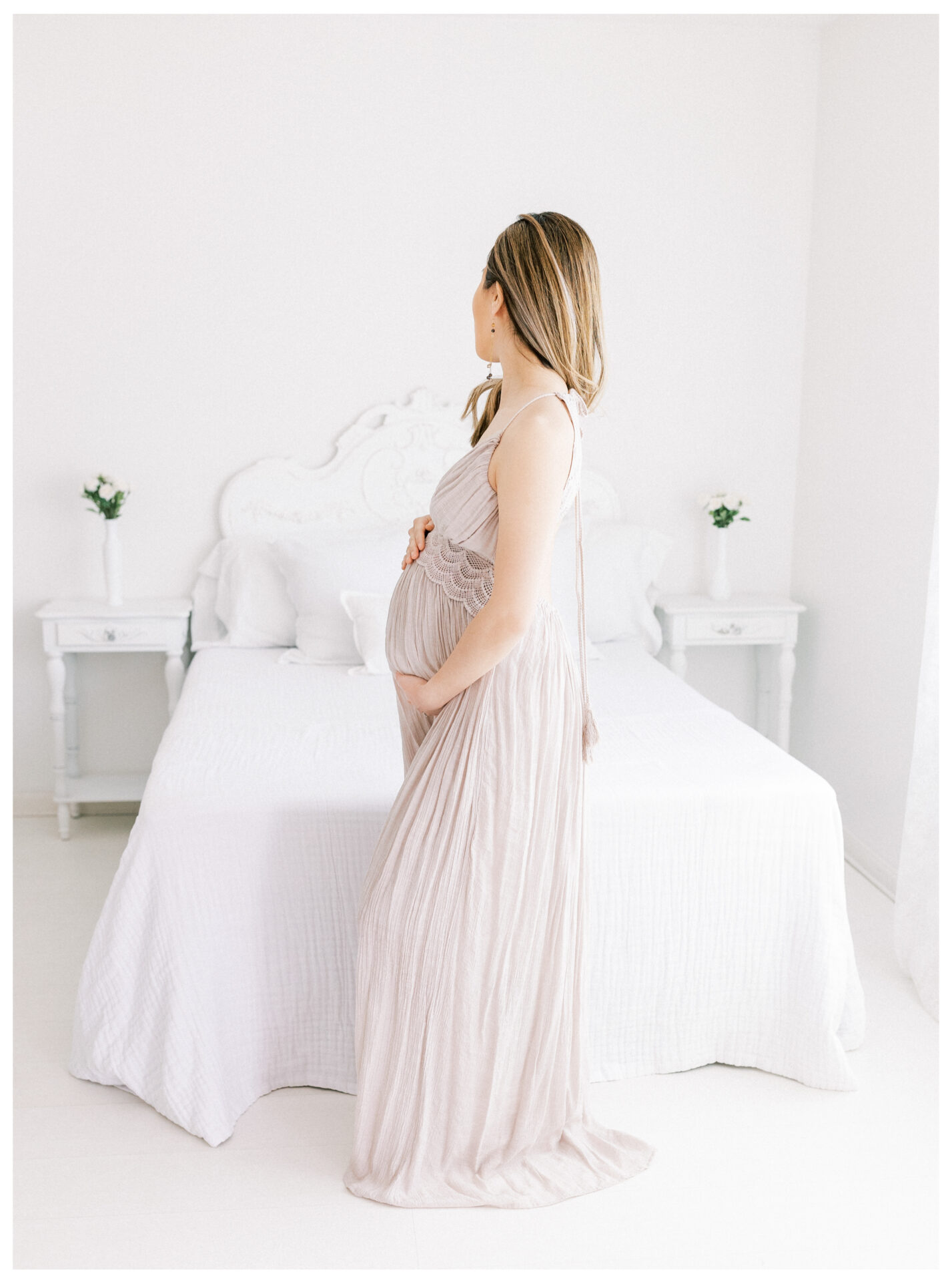 Winter Freire Photography | Fine Art Maternity Boudoir | Expecting mother wearing a long dress