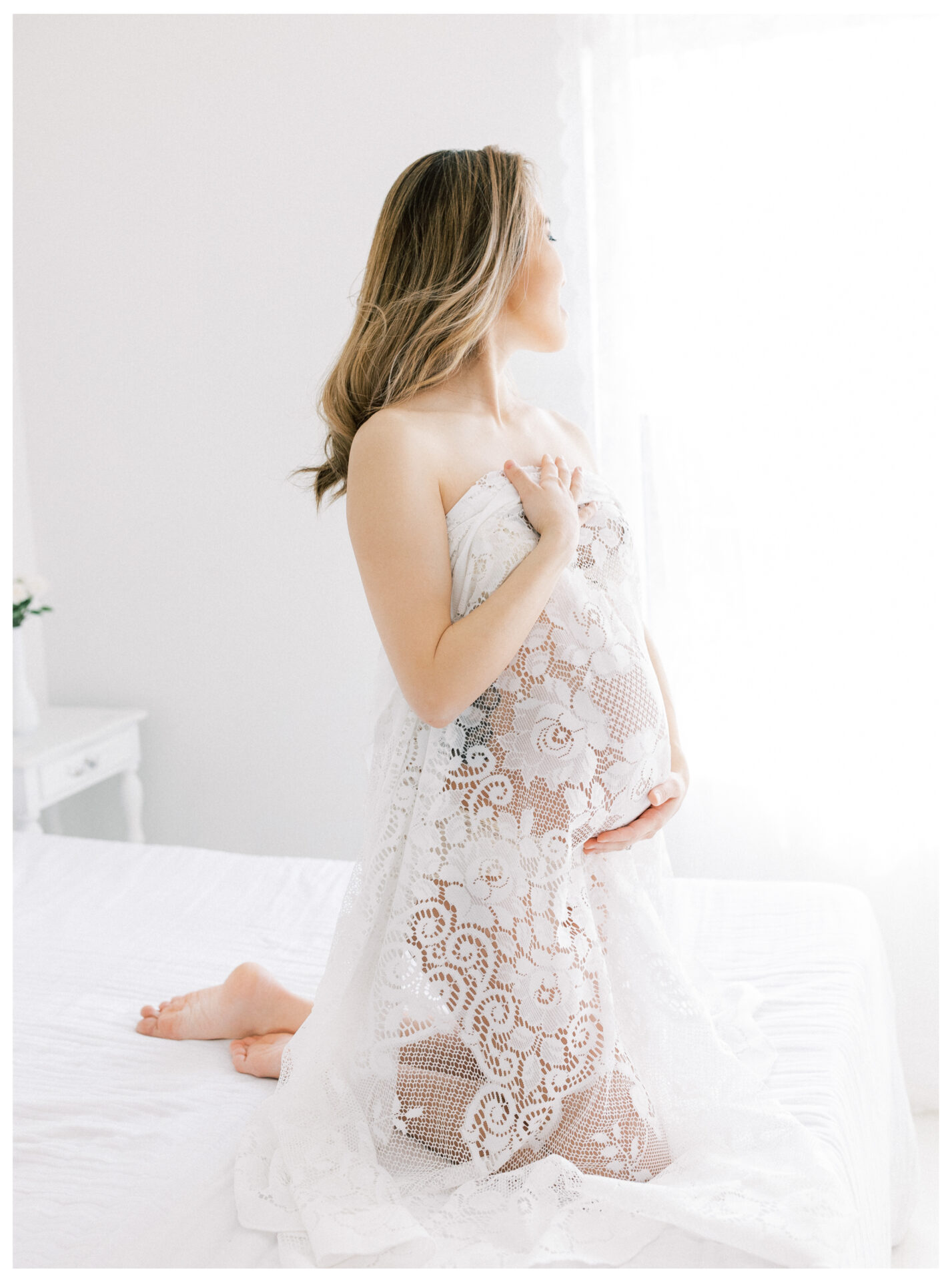 Winter Freire Photography | Fine Art Maternity Boudoir | Expecting mother holding vintage lace
