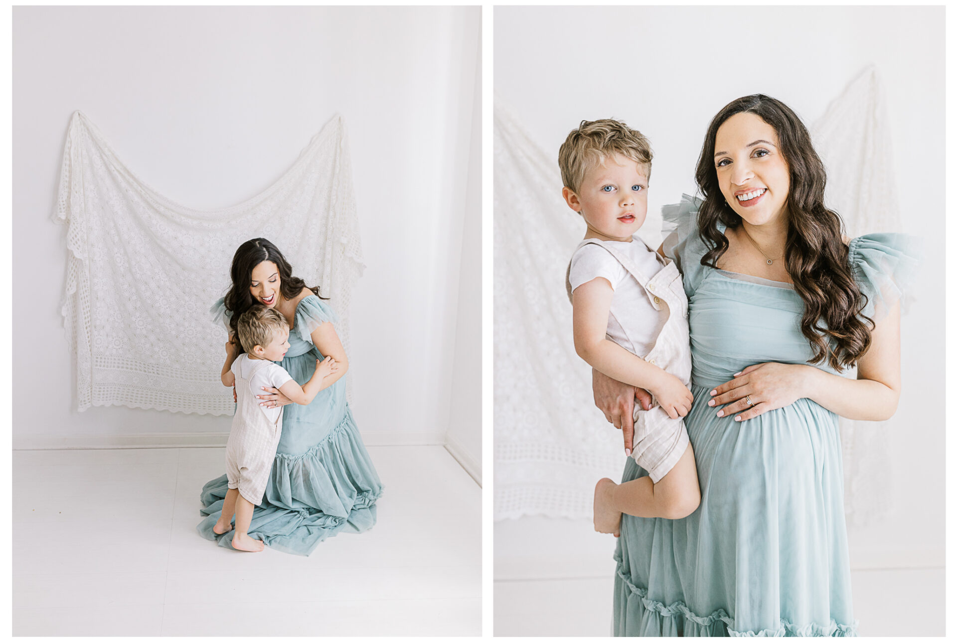 An expecting mother in a light blue dress poses with her young son whose wearing a light tan striped romper. In one photo, she kneels and hugs him; in the other, she stands holding him, both in front of a white lace backdrop and smiling gently.